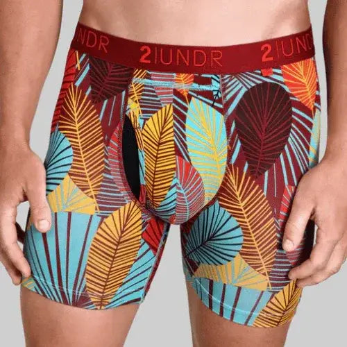 Colourful leaf-patterned underwear with '21UNDR' branding on a plain background