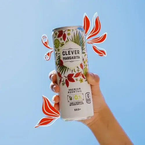 Hand holding a can of 'Clever Margarita' against a clear blue sky