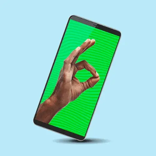 Phone with a hand gesture on a green screen against a blue background