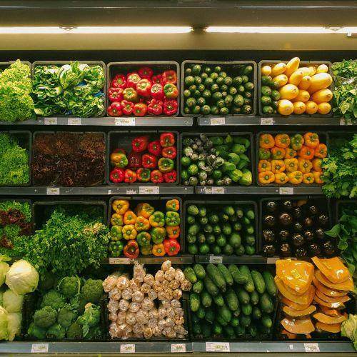 Organized vegetable display at Metro grocery store showcasing colourful fresh produce – Canadian-owned supermarket chain