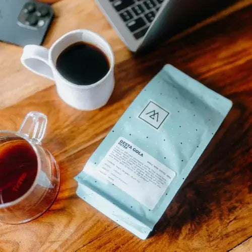 Monogram Coffee beans on a wooden table – Premium specialty coffee from a Canadian-owned roaster – Ethically sourced and roasted in Canada