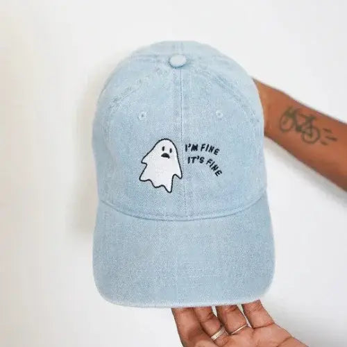 Light blue denim cap with embroidered ghost and 'I'm fine, it's fine' text – Playful Canadian-made accessory from OkayOK