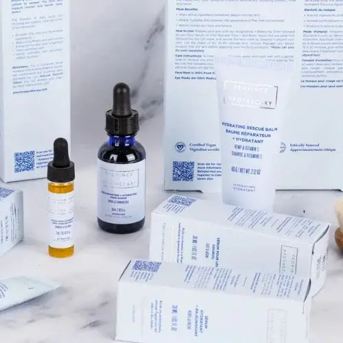 Province Apothecary skincare products including hydrating balm and facial serums on marble background