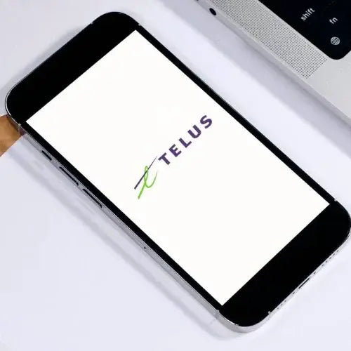 Smartphone with Telus logo on a white background