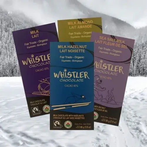 Whistler Chocolate bars in various flavors against a snowy background