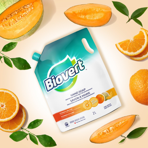 Biovert hand soap packaging with oranges and melons on a beige background