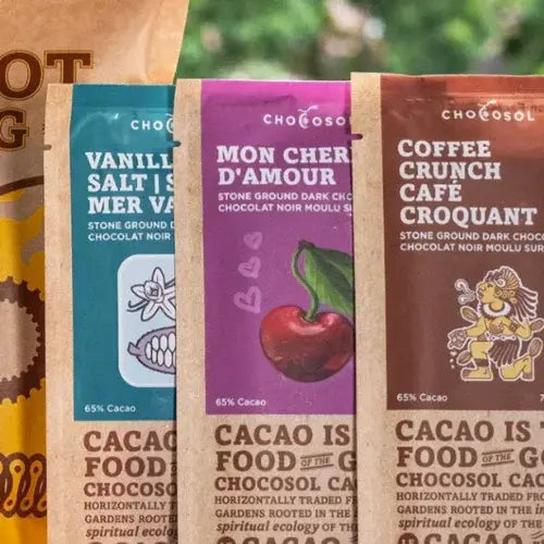 Row of Chocolatier Chocosol chocolate packaging with various flavors.