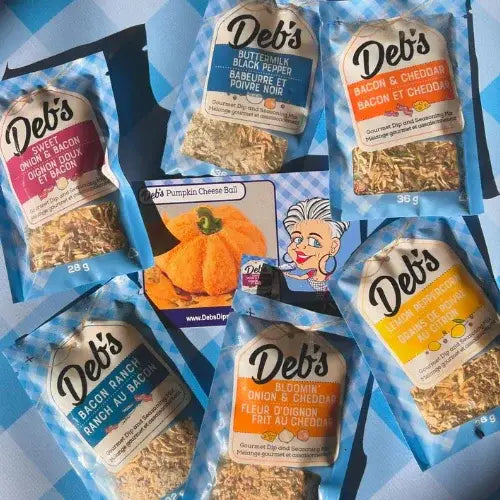 Deb's seasoning packets on a blue checkered background