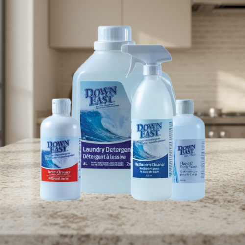 Collection of Down East cleaning products on a kitchen counter.