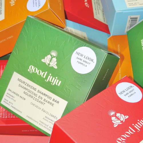 Good Juju shampoo bar boxes in colourful packaging, including nourishing shampoo bar