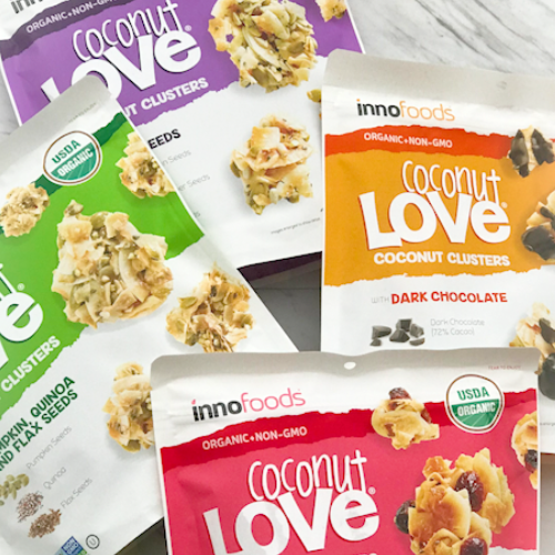 Assorted packages of inno foods Coconut Love coconut clusters with visible branding and product details.