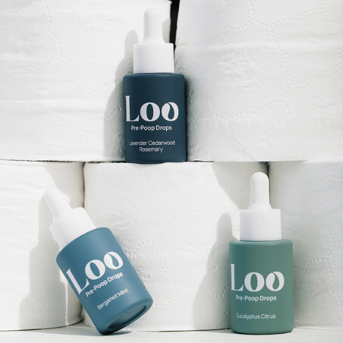 Three bottles of Loo Pre-Poop Drops on a white background