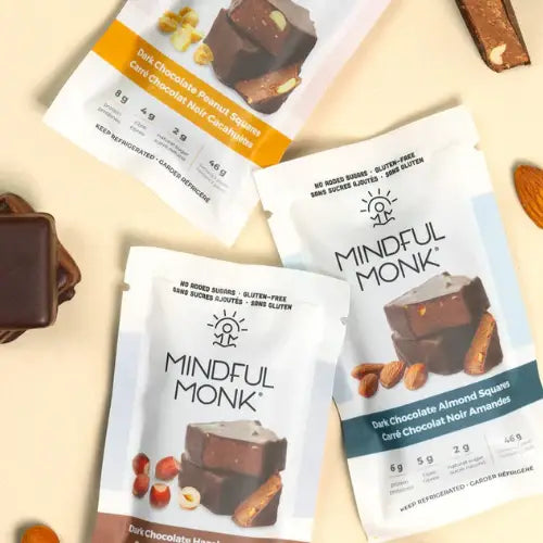 Mindful Monk chocolate snack packages on a light background