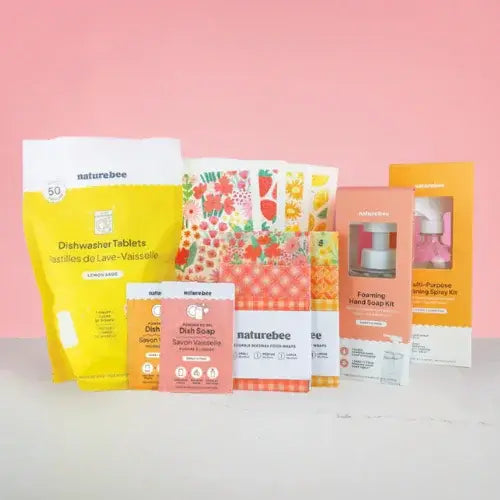 Collection of naturebee cleaning products on a pink background