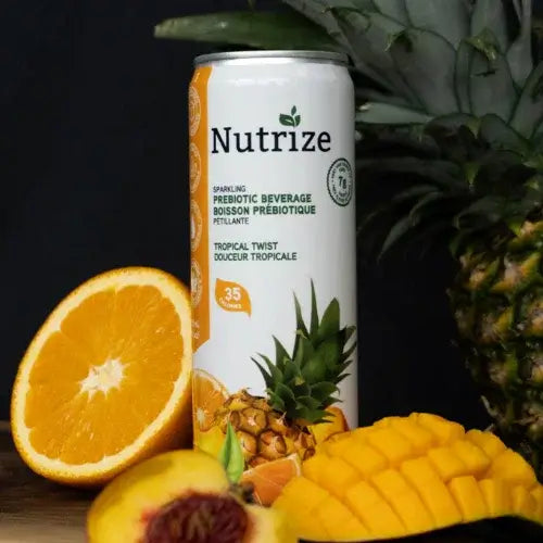 Nutrize sparkling probiotic beverage can with tropical fruits on a dark background