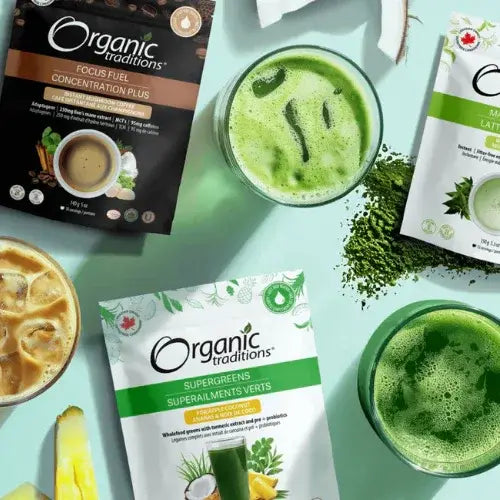 Organic Traditions products including a package of 'Supergreens' and 'Focus Fuel' on a light green background with green drinks.