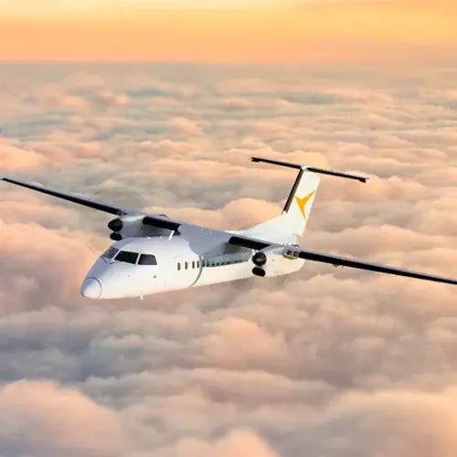 PAL Airlines Airplane flying above the clouds with a sunset or sunrise in the background