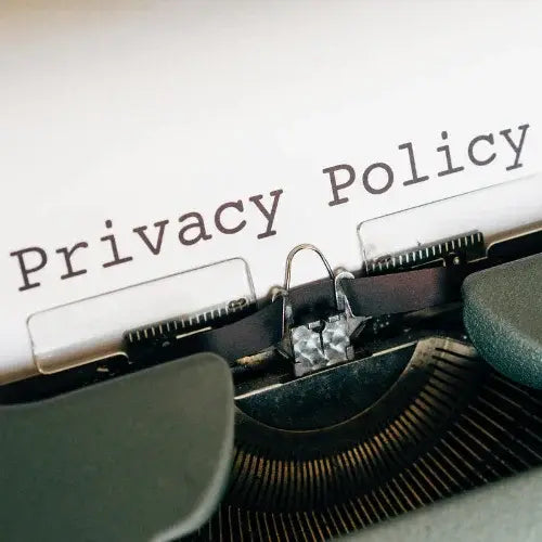 PrClose-up of typewriter with “Privacy Policy” text – representing website data protection and privacy practices.