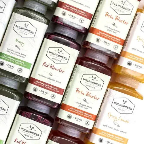 Collection of Pulp & Press juice bottles with various flavors.