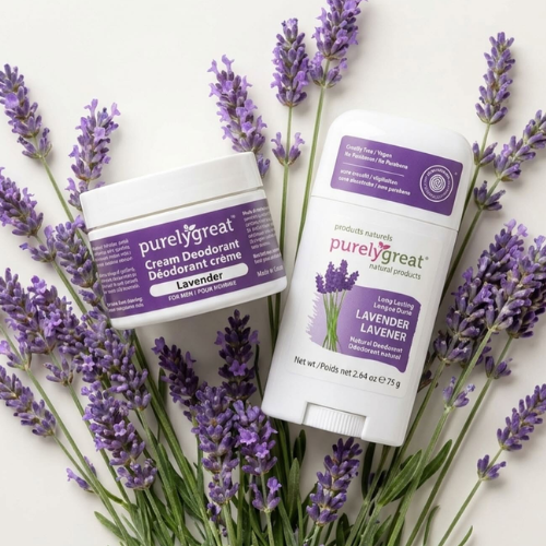 Two 'purelygreat' lavender products surrounded by lavender flowers on a white background