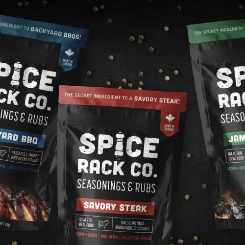 Spice Rack Co. seasoning and rub packages on a dark background