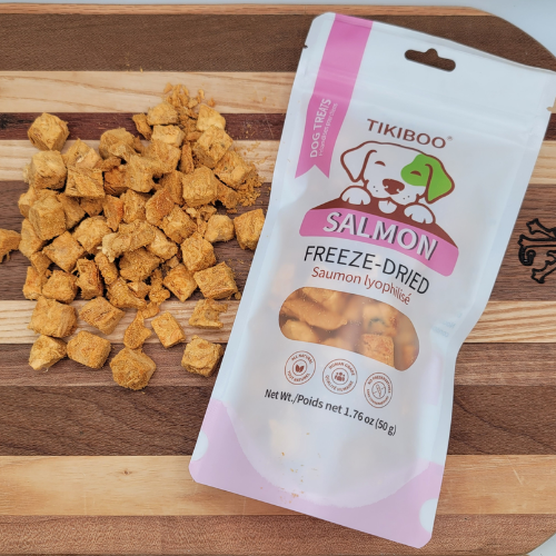 Tikiboo Salmon Freeze-Dried dog treats on a wooden board