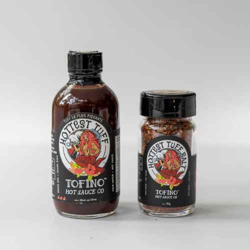 Two hot sauce bottles from Tofino Hot Sauce Co. on a white background